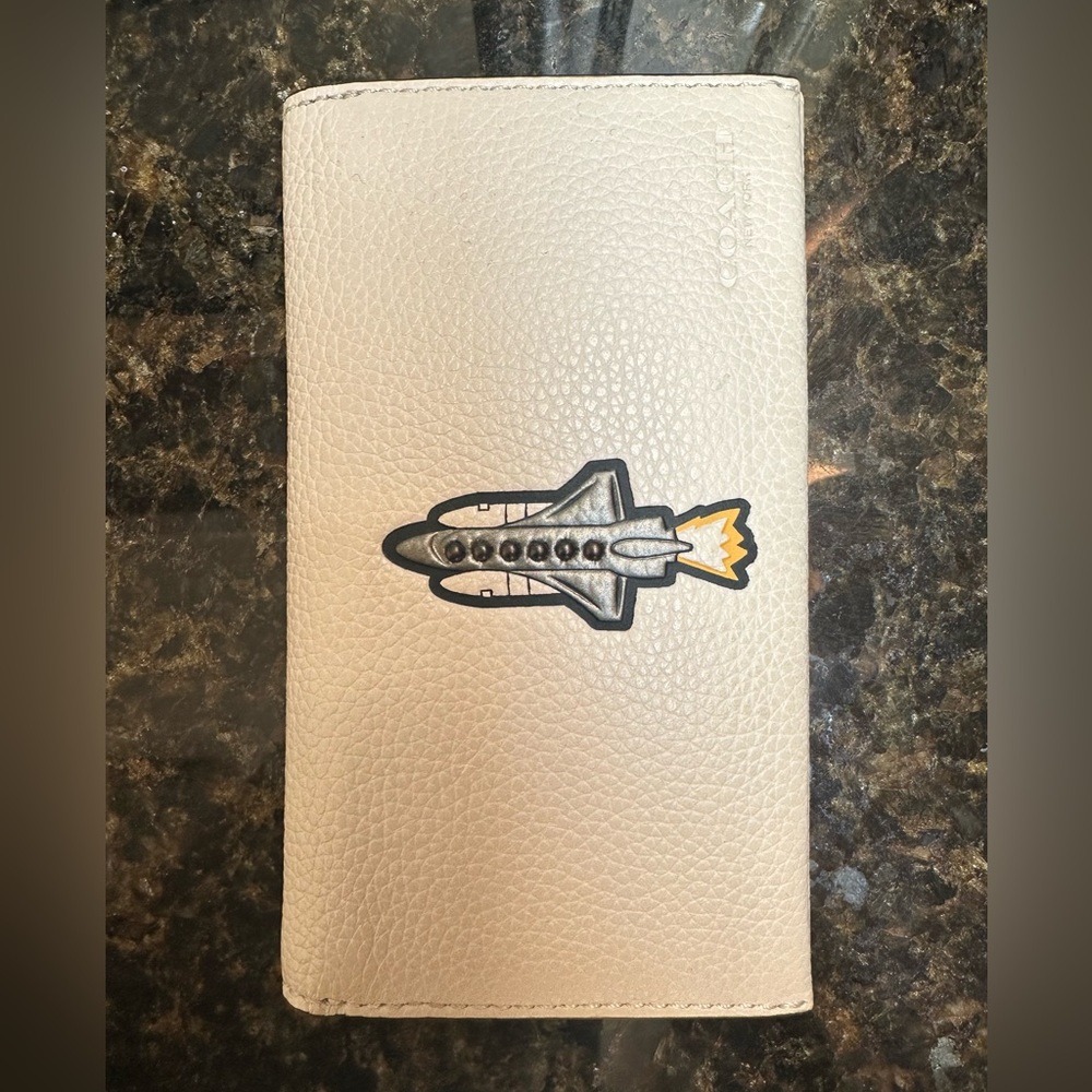 COACH never-used White 3.25” x 6” x 0.5” Wallet